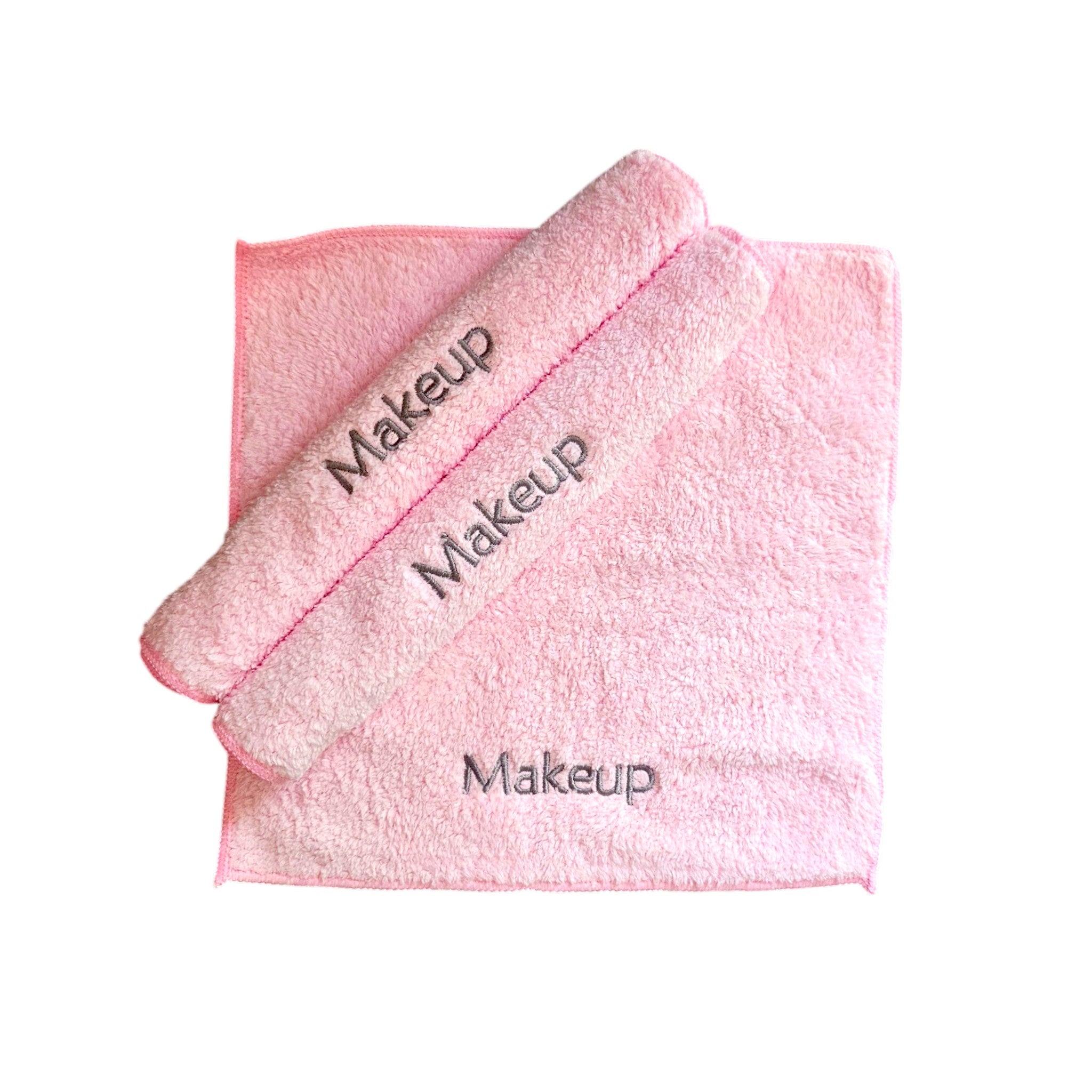 A soft, eco-friendly ESQ Skincare Clean Slate™ Microfiber Cloth in a neutral tone, neatly folded beside a skincare routine setup, highlighting its gentle, reusable, and sustainable design for effortless makeup removal. 🌿✨