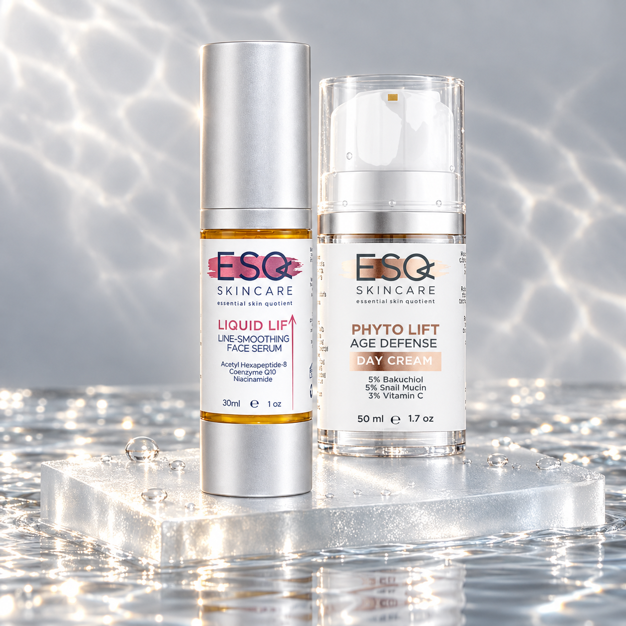 Two skincare products from ESC Skincare stand on a clear acrylic pedestal in a reflective, water-like setting. The left product is a silver bottle of Liquid Lift Line-Smoothering Face Serum, and the right product is a clear bottle of Phyto Lift Age Defense Oxygen Cream with a white pump.