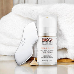 Firm & Glow Power Pair gift set featuring Cell Renew Restructuring Face Cream with Matrixyl 3000 and a sleek face massage tool for anti-aging skin care.
