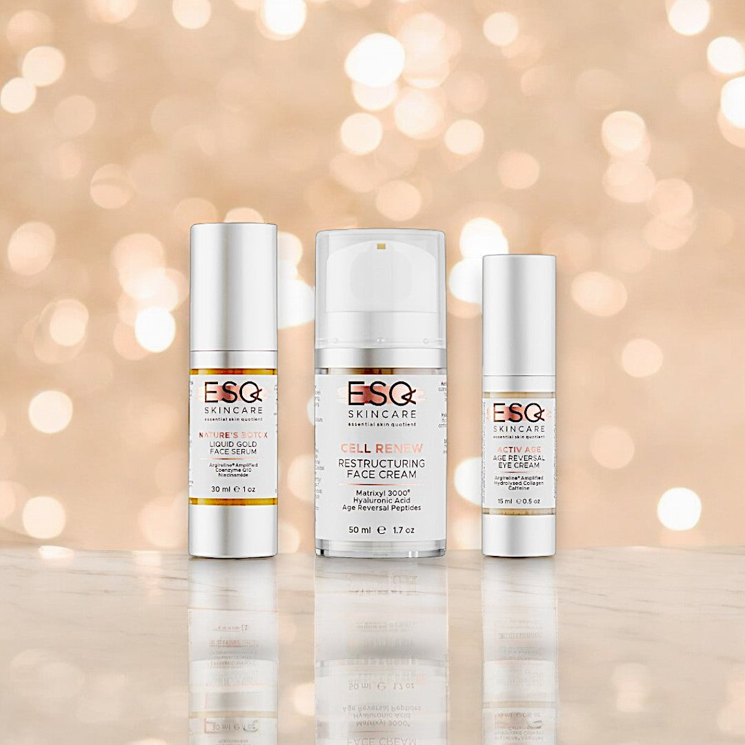 ESQ Skincare Supreme Care Gift Set featuring three premium anti-aging skincare products: Cell Renew Restructuring Face Cream, Nature's Botox Liquid Gold Face Serum, and Activ~Age Age Reversal Eye Cream, arranged elegantly against a soft background.