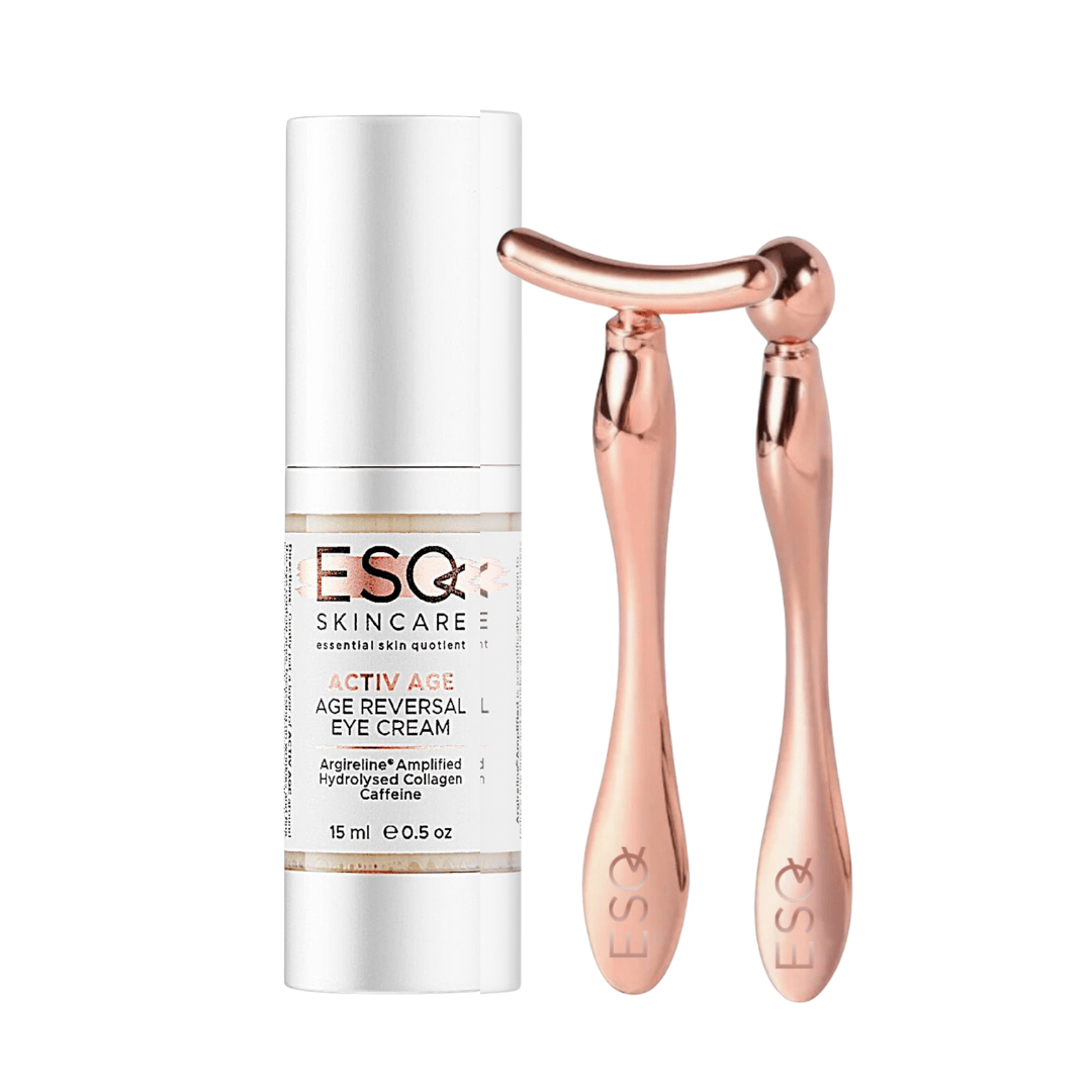 ESQ skincare eye cream bottle and rose gold roller on a white background