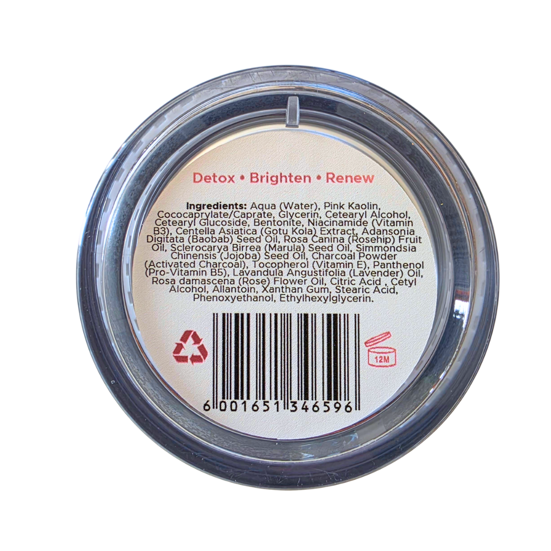 The back of a round clear plastic jar with a white paper label, showing the ingredients list for Detox Brighten Renew. The product is photographed on a clean white background.