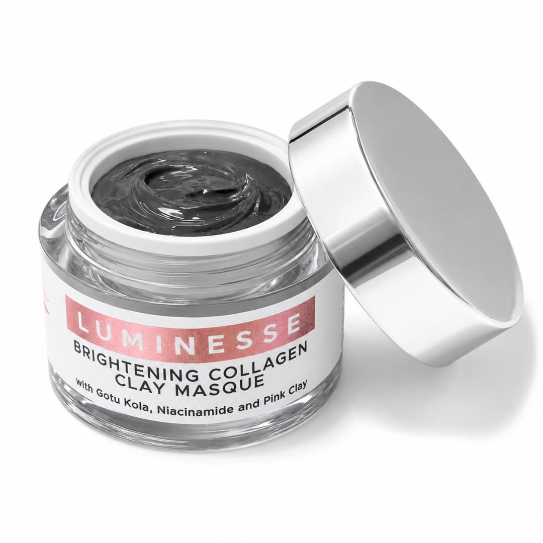 A clear glass jar of Luminesse Brightening Collagen Clay Masque with its metallic silver lid leaning against it, showing the dark gray clay mask inside, on a white background.