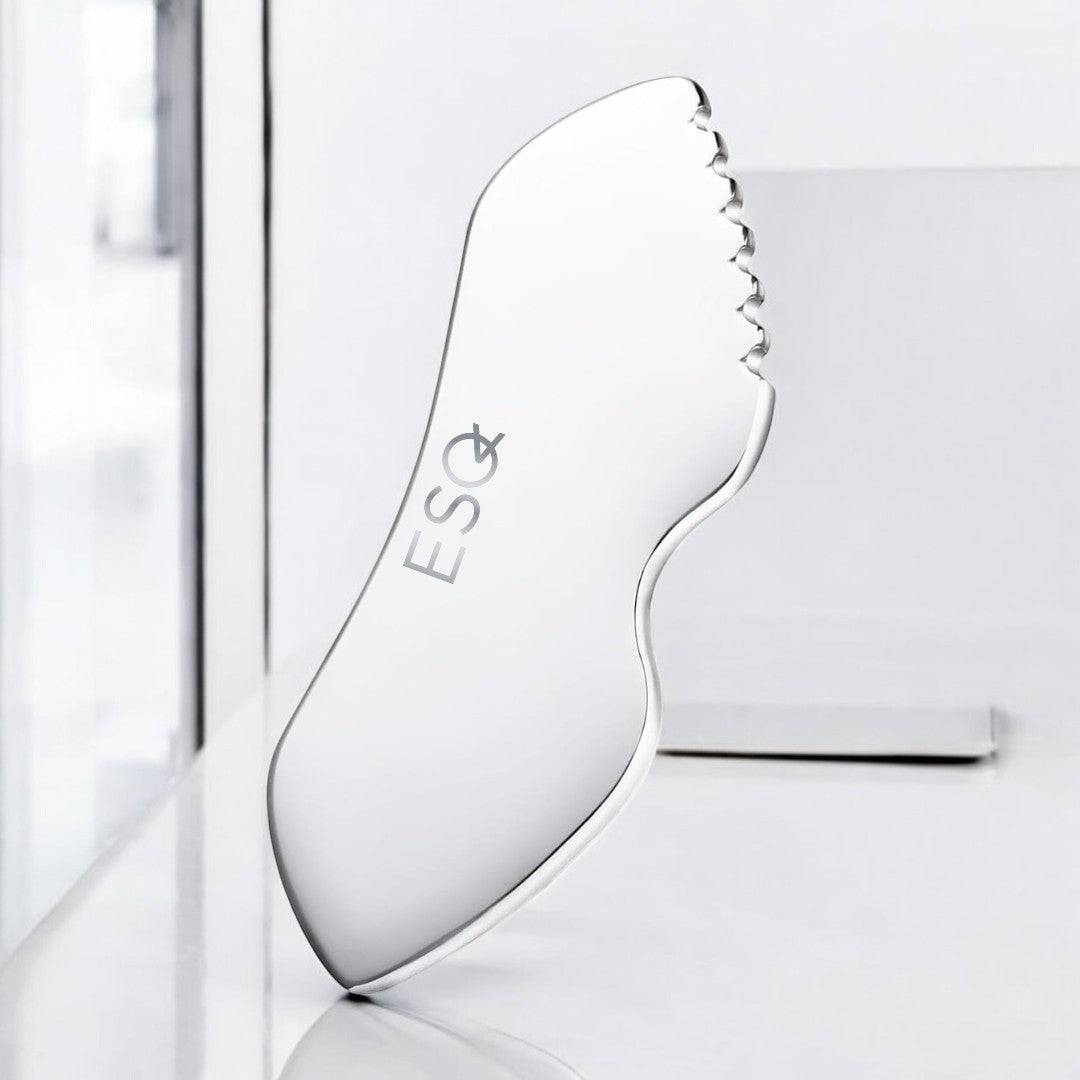 ESQ Skincare Stainless Steel Facial Gua Sha with ergonomic design for lymph drainage and enhanced circulation, promoting youthful skin.