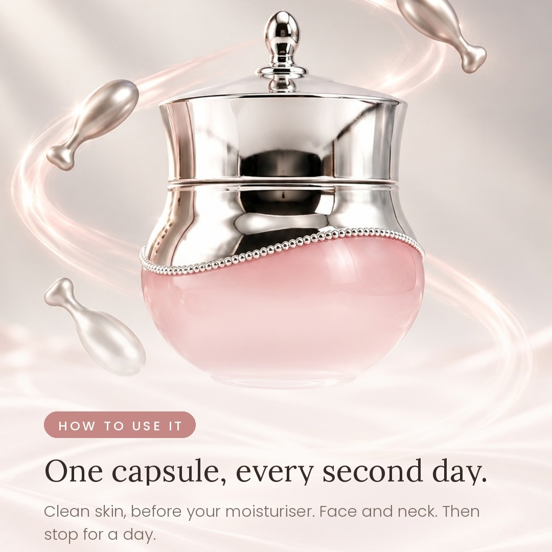 A cosmetic jar with a shiny silver lid and a translucent pink lower body, shown with floating silver applicators and text reading 'HOW TO USE IT' and 'One capsule, every second day.'.